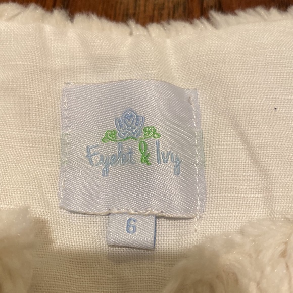 Eyelet and Ivy vest with ribbon tie.  Girls size 6.  Faux fleece in cream. - Picture 2 of 3